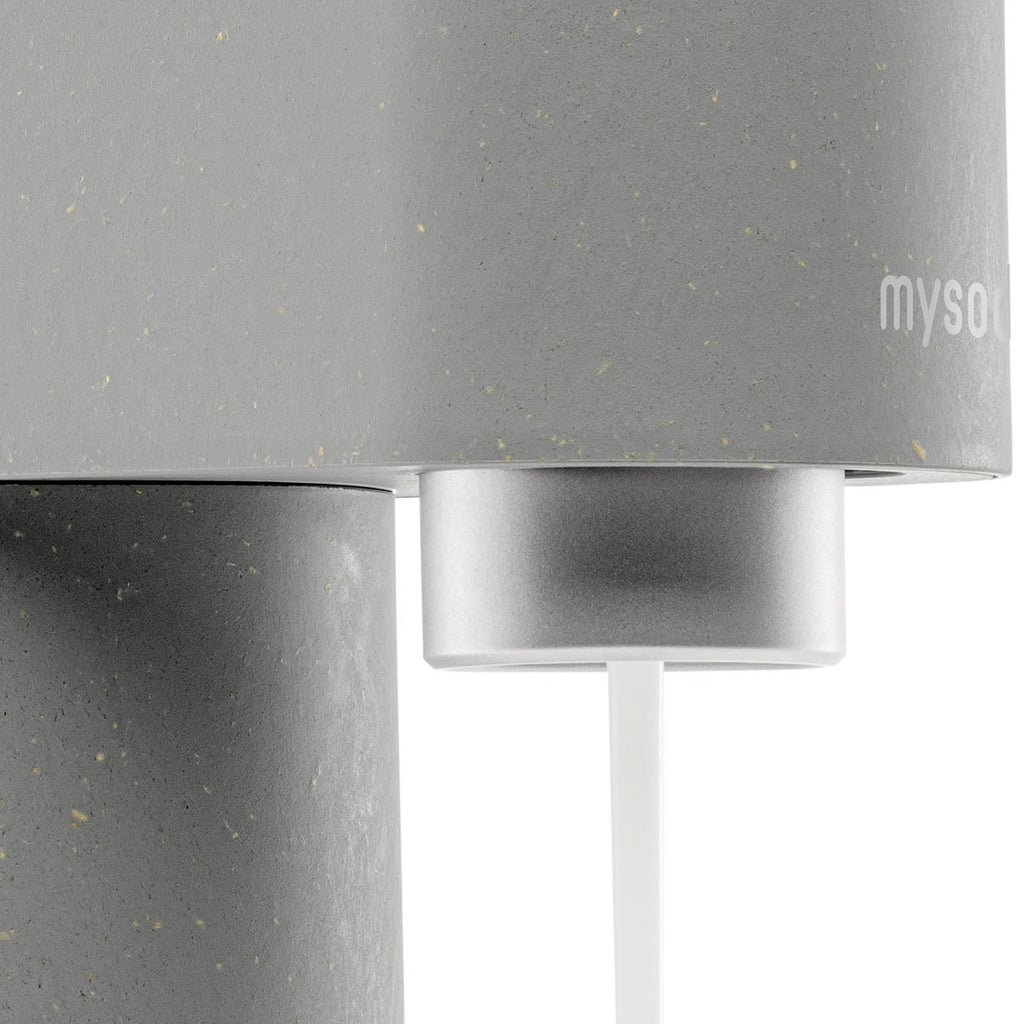 A close-up of a gray Mysoda Woody sparkling water maker